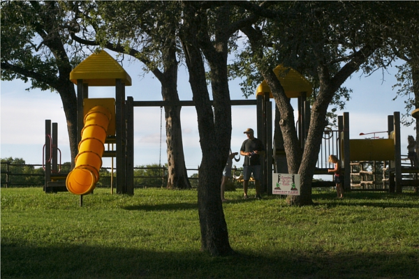 A Family Enjoying the Playground